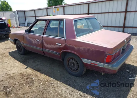 1989 Plymouth Reliant Le z USA, uszkodzony, nr VIN 3P3BK46DXKT973073